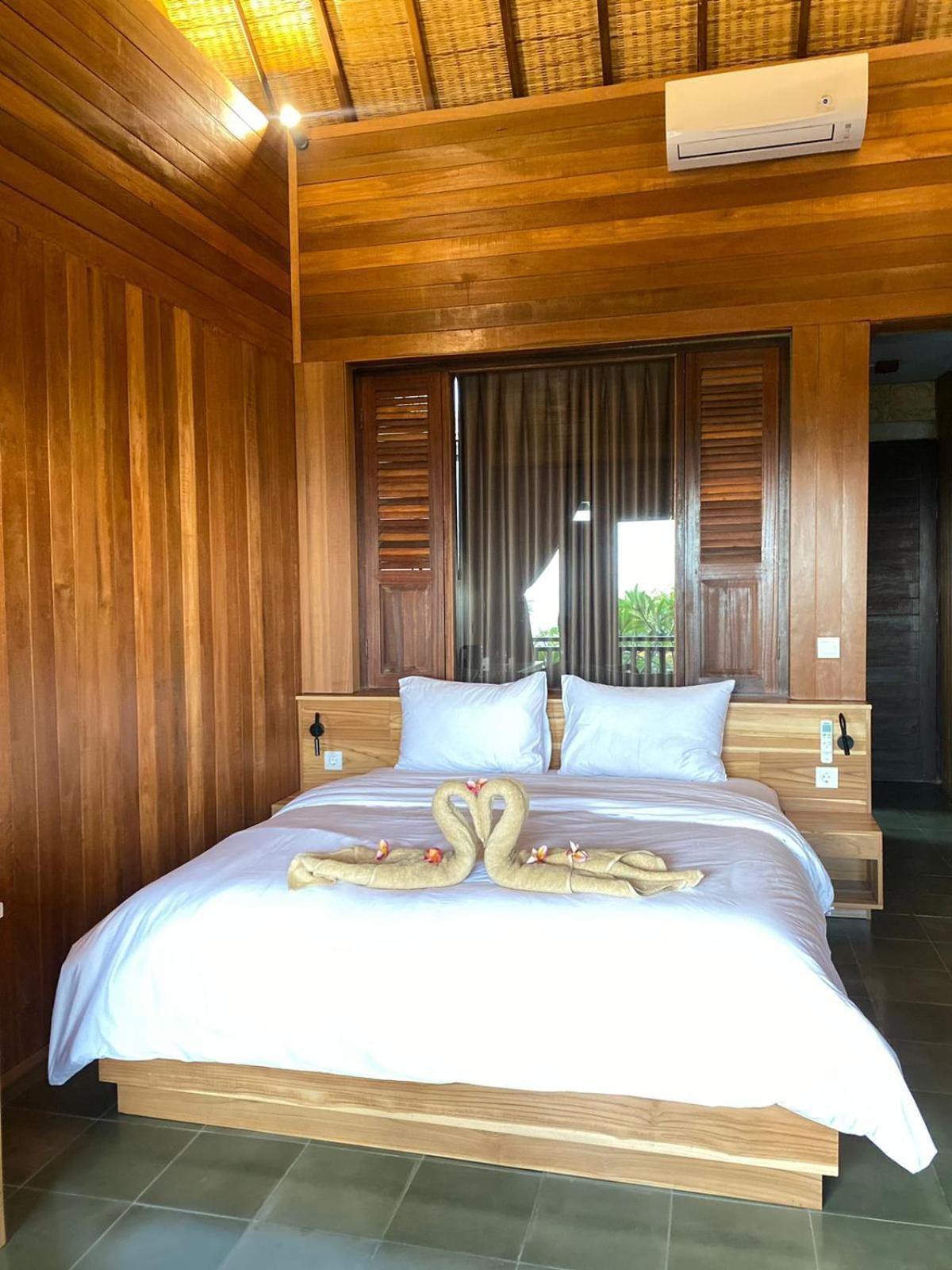 Putra'Lebah Amed Guest House エクステリア 写真